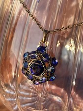 Konplott Kette und Ohrringe in