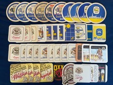 42 alte+neue Bierdeckel Goldochsen Ulm, 11x 60er-Jahre (davon3x Impr. kopfst. T)