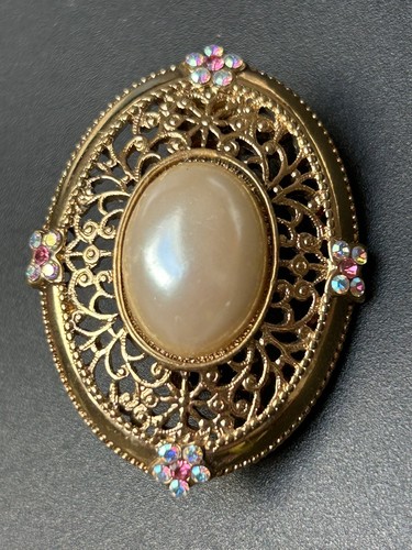 Goldfarbene brosche - goldfarbene,