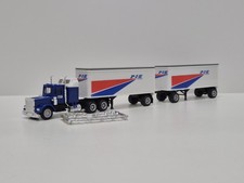 Herpa/ Promotex Kenworth mit 2 Trailern PIE 1/87 H0