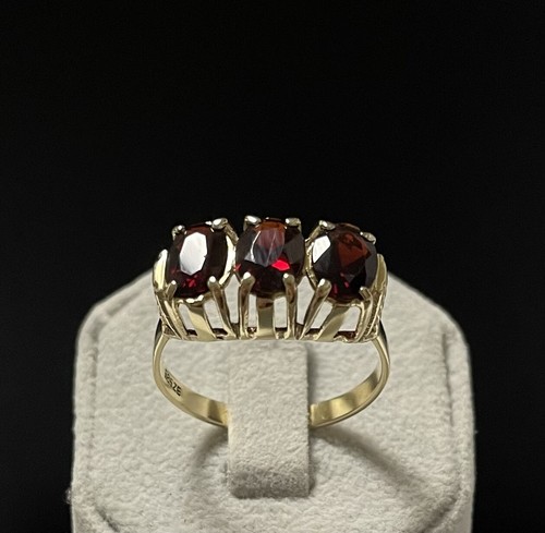 Goldring damenring mit granat - goldring,