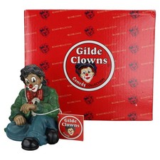 Figur Clown sitzend mit
