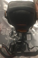 Canon EOS 700D mit AutofokusObjektiv,Ladegerät mit Ersatzt-Akku und Tragetasche