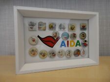 Aida Pin Sammlung von 2007-2025 im Bilderrahmen. Rahmen 11 x 16 cm 19 Pins !!!!!