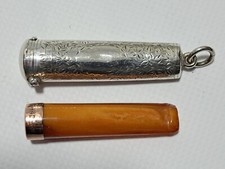 25-1-9 Zigarettenspitze aus Bernstein mit 9 Kt Goldmontur im Sterlingsilber Etui