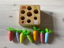 Neuwertiges Baby Holzsspielzeug laut Hersteller ab 6 Monate im Originalkarton