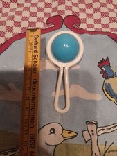 1 Stück  Puppenrassel Weiß