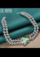 ARMBAND MIT ANHÄNGER