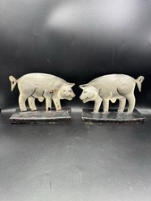 Paar antike Schweinfiguren aus