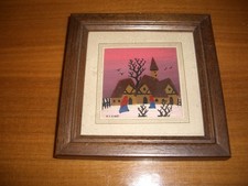 Naive Kunst Dorf im Winter mit