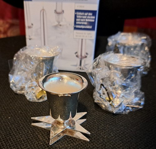 Versilberte kerzenhalter zum - 4,