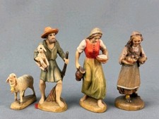 Vier kleine Figuren, 3 davon