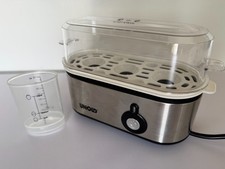 Unold Eierkocher Mini drei Eier Edelstahl 210 W inkl. Messbecher mit Eierpiekser