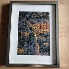 Bilderrahmen mit Puzzle-Schneemann Thomas Kinkade
