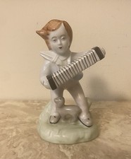 Little Boy Playing Accordion