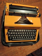 DDR Schreibmaschine daro Erika Modell E 100 Reiseschreibmaschine 1977 orange