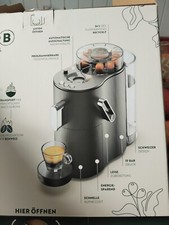 Kaffeemaschine, schwarz, wenig