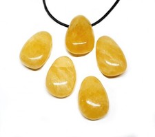 Orangencalcit Trommelstein