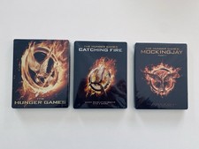 Hunger Games Steelbooks Teil 1 (Future Shop) Teil 2 & Mockingjay Teil 1 (Zavvi)