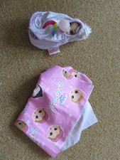 BABY BORN surprise: Puppenset: Puppe mit Wickeltuch "Einhorn" und Zubehör