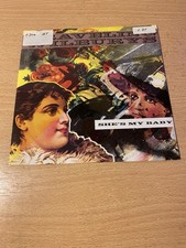 7" TRAVELING WILBURYS * She`s