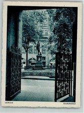10502415 - 7000 Leipzig Goethedenkmal durch ein schmiedeeisernes Tor gesehen ca