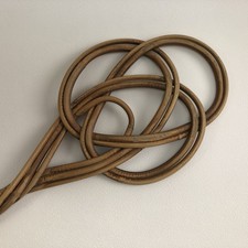 kleiner alter Teppichklopfer