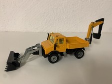 Siku Super 1:55 Unimog U1500 m. Bagger  2615 Straßenbau Gelb Baustelle Weihnacht