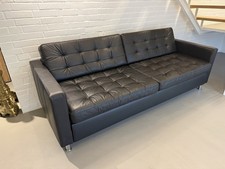 Schwarzes Ledersofa mit