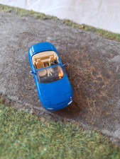 Modellauto 1:87 von  Herpa  Mazda  MX -5   blau mit Figur   Cabrio