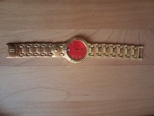 Krug-Baümen Charleston Armbanduhr mit rotem Zifferblatt und goldenen Armband