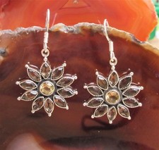 RX Ohrring Blume Stern