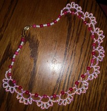 Collier in Rosa/Rot mit