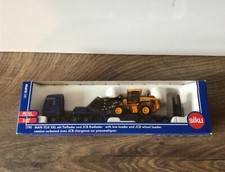 MAN TGX mit Tieflader & JBC