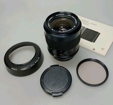 Minolta  MC W. Rokkor-HH 35mm F1.8  + Lens Hood