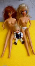 8 Vintage Barbie Puppen von