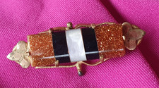 Art Deco Brosche mit Perlmutt , Onyx und Goldfluss