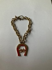 Aigner Armband, Taschenanhänger ,50 Jahre , neuwertig