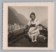 Frau im Ruderboot auf dem