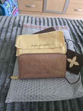 Louis Vuitton Geldbörse Zippy Lackleder Braun
