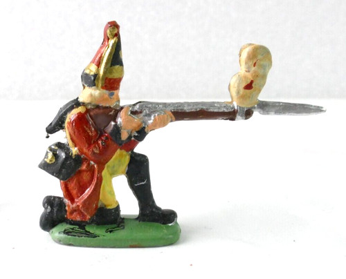 Musketier knieend schießend