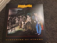 MARILLION - CLUTCHING AT