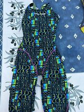 Head, Powerskin, offener Rücken, lila grün schwarz mit Schriftzug