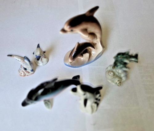 Sechs delfin figuren aus - sechs,