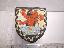 älteres Wappen Stoff Metallring innen stehender Löwe Wasser Dänemark Militär?