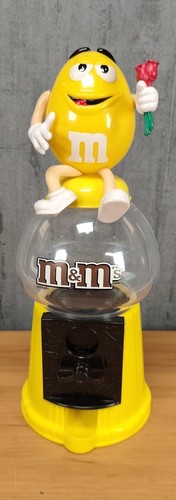 Yellow candy dispenser - m&m's,