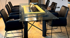 gebrauchter Esstisch aus Glas