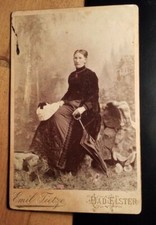 Woman in crinoline with apron