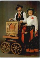 12042280 - Drehorgel - Trachten - schoene color Foto AK Drehorgel / Leierkasten