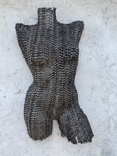 Handcrafted female metal torso